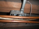 copper-pipe-contacting-the-front-of-an-uncovered-electrical-junction-box